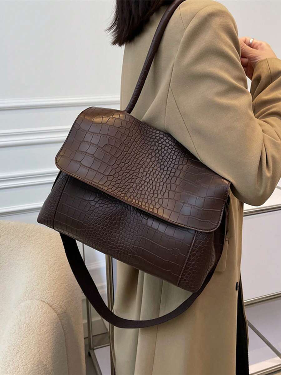 Varelle Croc-Embossed Satchel in coffee brown, worn on the shoulder