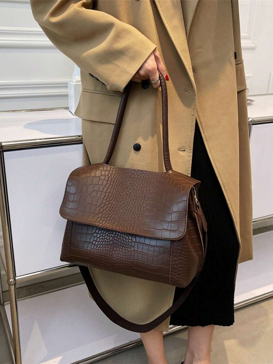 Varelle Croc-Embossed Satchel in coffee brown, carried by hand