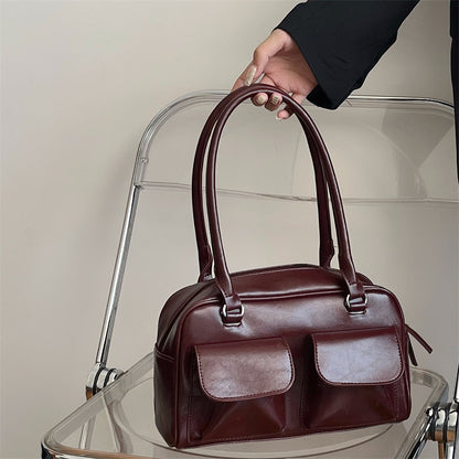 Romy Glossy Pocket Bag in wine red, front view