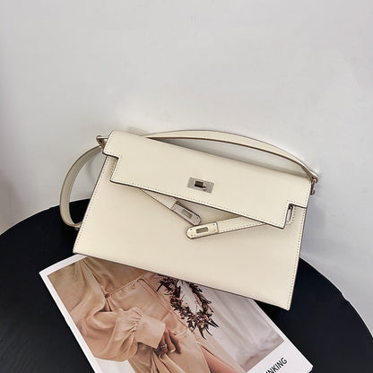Élise Envelope Shoulder Bag in milkshake white with silver hardware