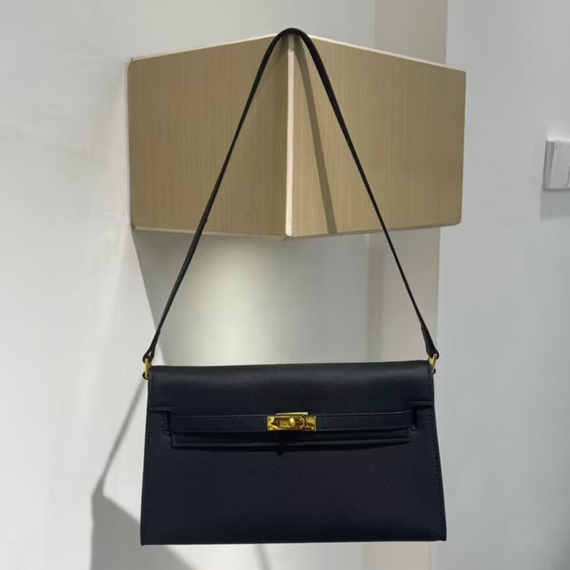 Élise Envelope Shoulder Bag in black with gold hardware